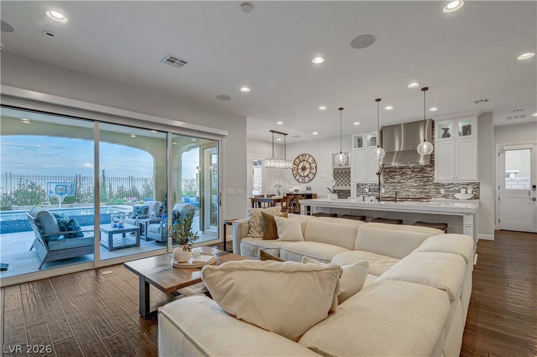 274 Evante Street, Las Vegas, NV 89138 An open-concept living space transitions seamlessly to an outdoor oasis with a sparkling pool.