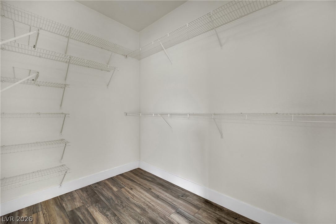 5823 Golden Wing Street, Las Vegas, NV 89113 Ample shelving and hanging space in this well-appointed walk-in closet.