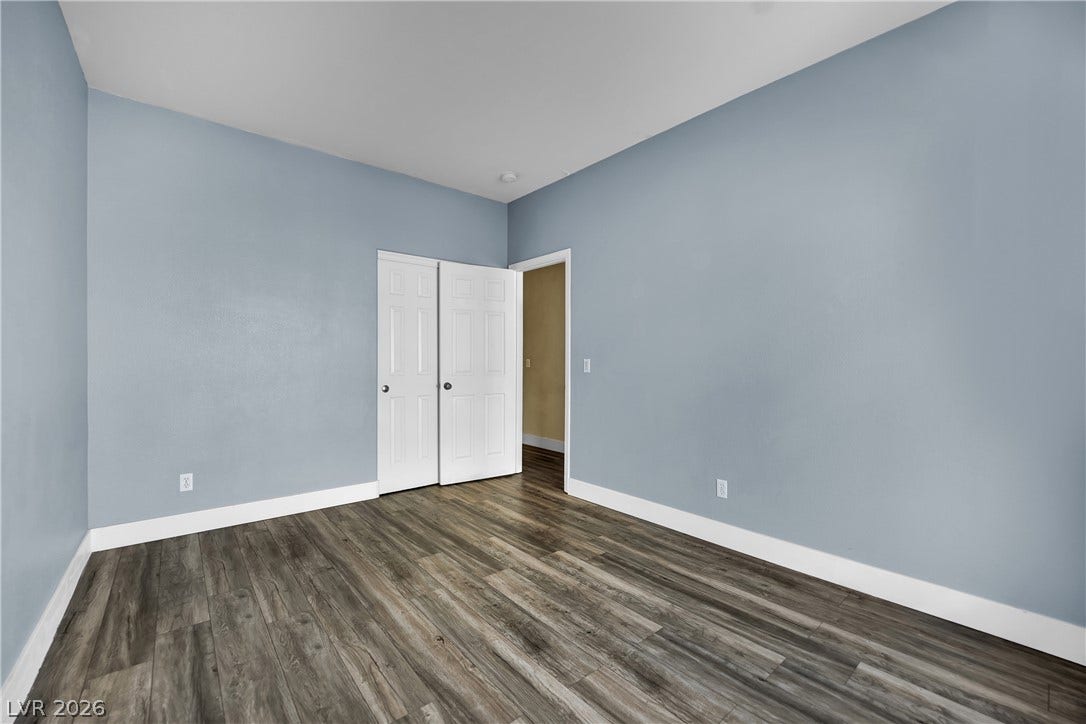 5823 Golden Wing Street, Las Vegas, NV 89113 A well-lit room showcasing durable flooring and ample closet space.