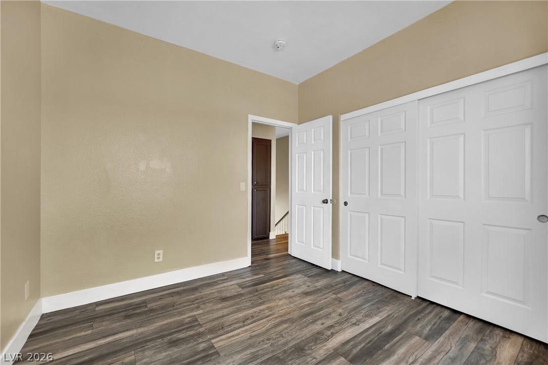 5823 Golden Wing Street, Las Vegas, NV 89113 Well-lit room featuring durable wood-like flooring and ample closet space.