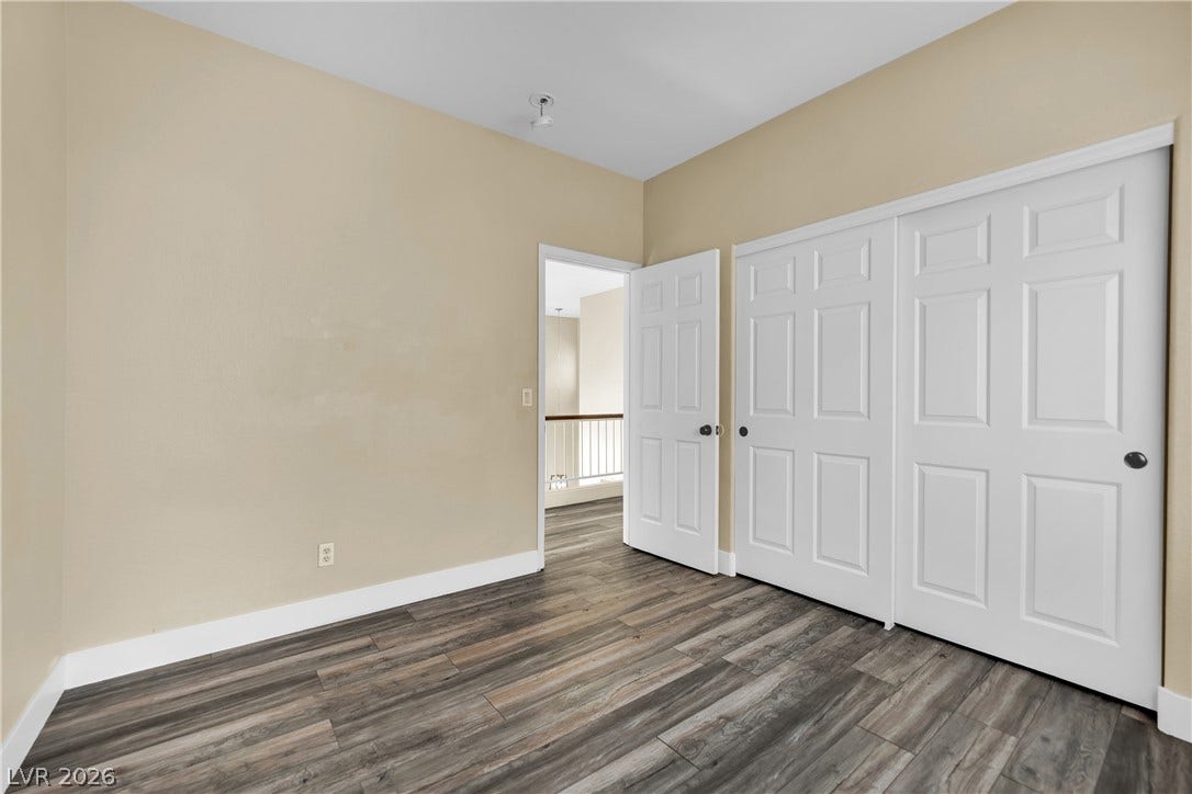 5823 Golden Wing Street, Las Vegas, NV 89113 Natural wood-look flooring extends through this room, which includes ample closet space.