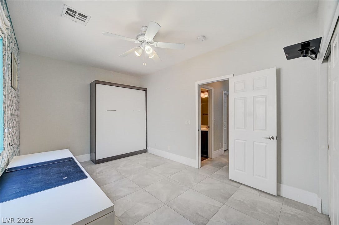 3720 Russell Peterson Court, Las Vegas, NV 89129 Downstairs Bedroom with Murphy Bed