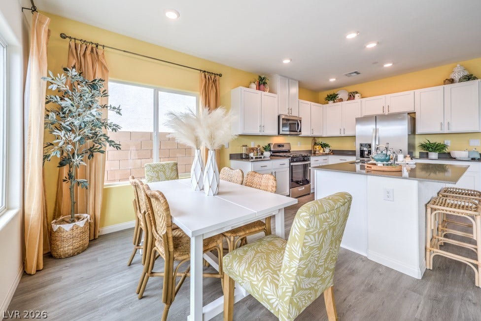 1090 Saffron Toucan Lane, Henderson, NV 89011 Dining space featuring recessed lighting and light wood-style floors. Home is representational only; actual home finishes may vary.