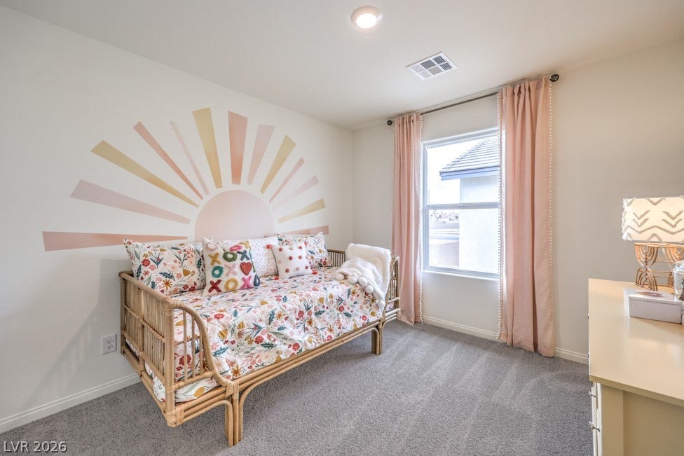 1090 Saffron Toucan Lane, Henderson, NV 89011 Carpeted bedroom with baseboards. Home is representational only; actual home finishes may vary.