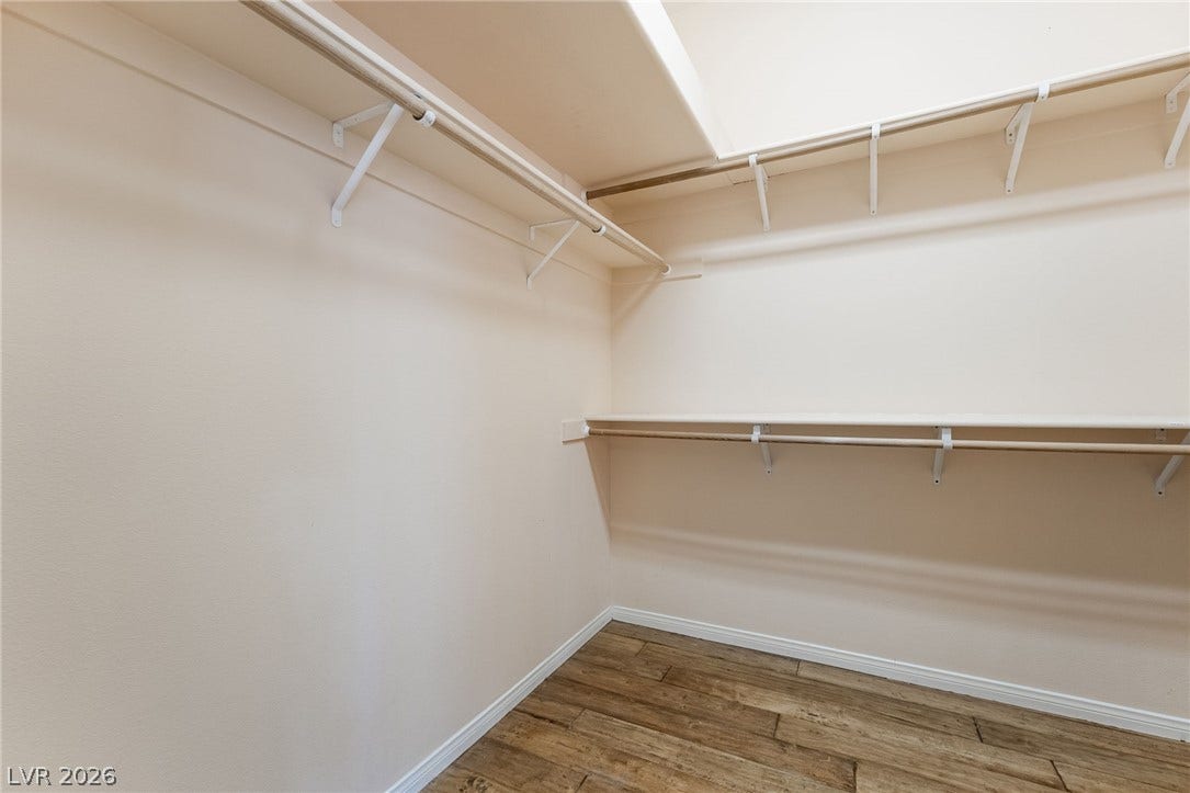 3775 Rick Stratton Drive, Las Vegas, NV 89120 Ample shelving and hanging space characterize this organized and functional closet.