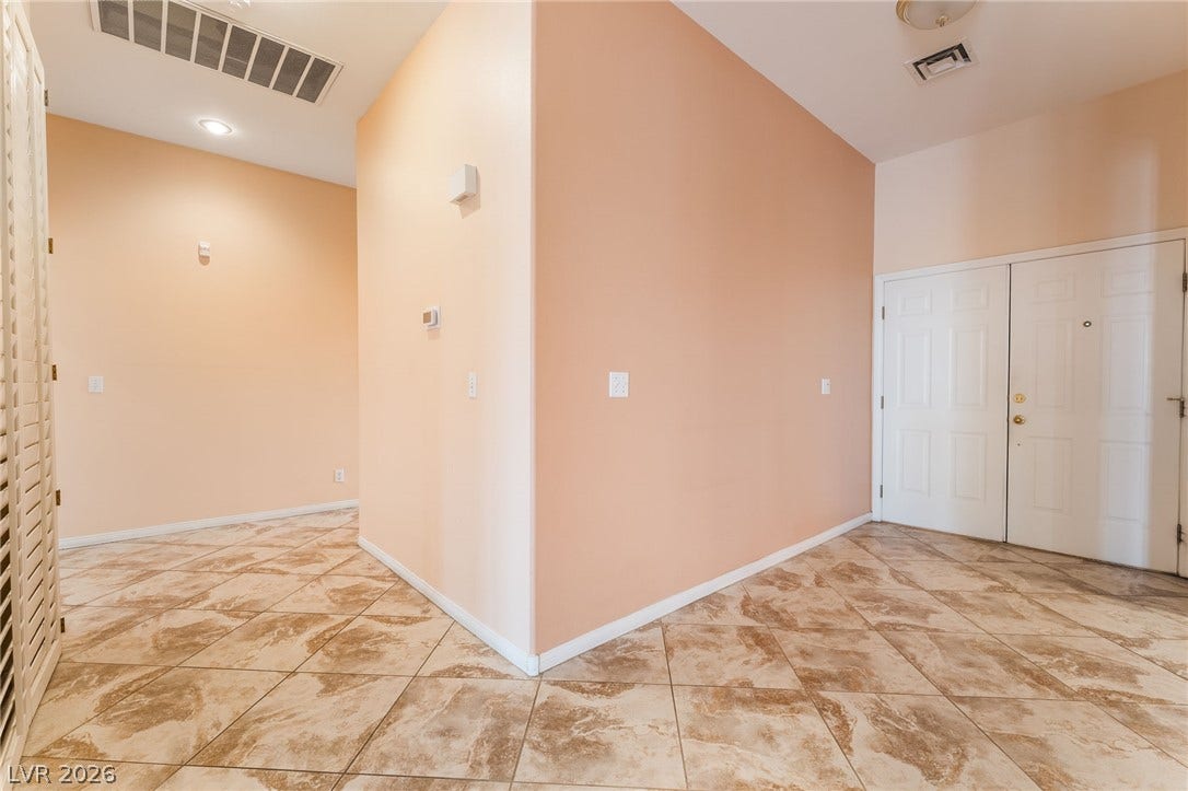 3775 Rick Stratton Drive, Las Vegas, NV 89120 Clean tile flooring and a double entry door define this versatile interior space.