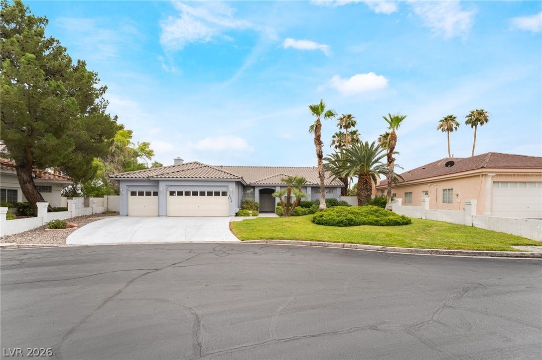 3775 Rick Stratton Drive, Las Vegas, NV 89120 A well-maintained facade with an attached garage and lush, verdant landscaping welcomes you home.