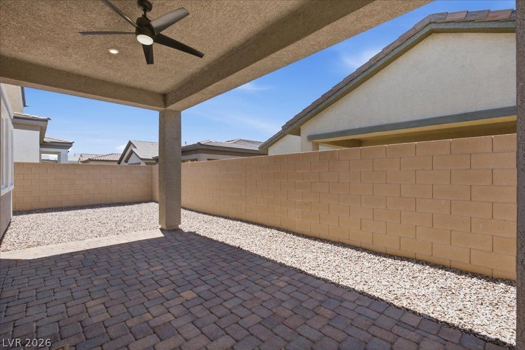 847 Eaton Falls Street, Henderson, NV 89011 A spacious covered patio with paver flooring provides a comfortable outdoor living area.