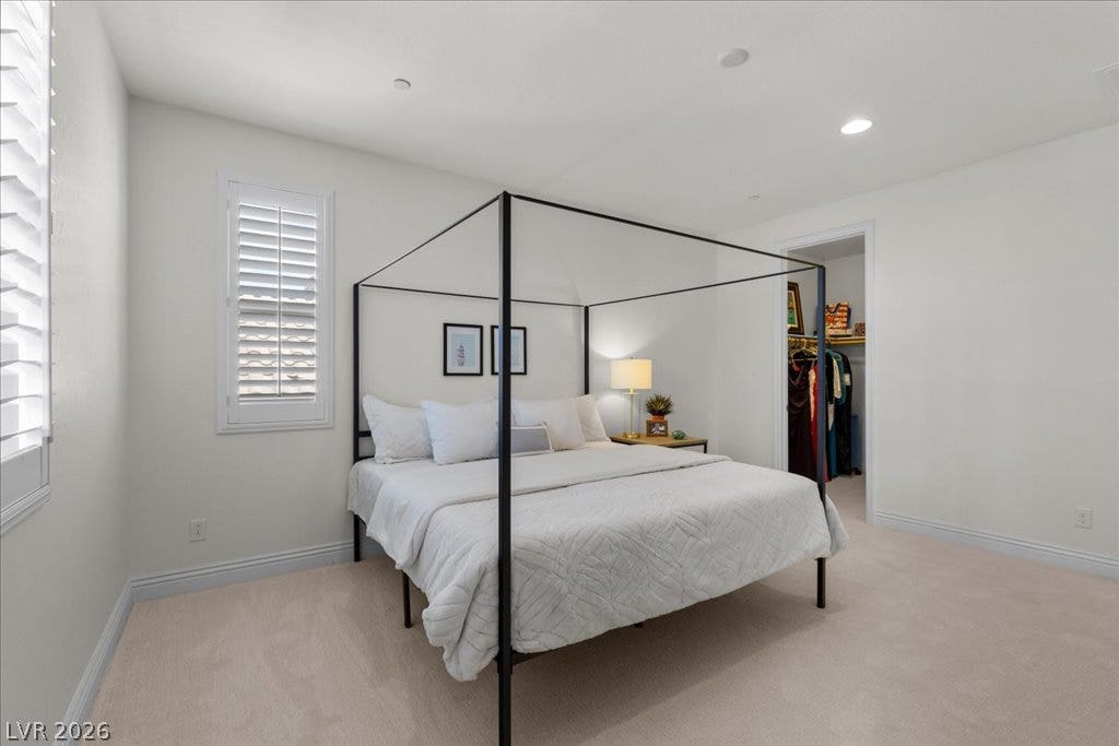 2828 Josephine Drive, Henderson, NV 89044 Well-lit sleeping quarters with elegant plantation shutters and a spacious walk-in closet.