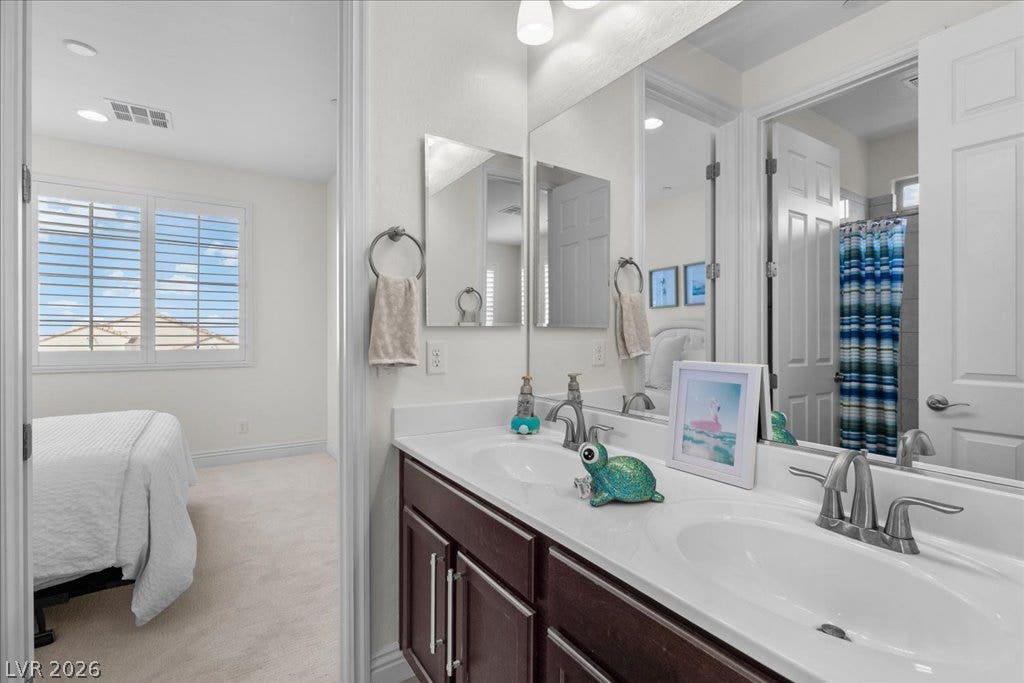 2828 Josephine Drive, Henderson, NV 89044 Jack and Jill Bath offers double vanity.