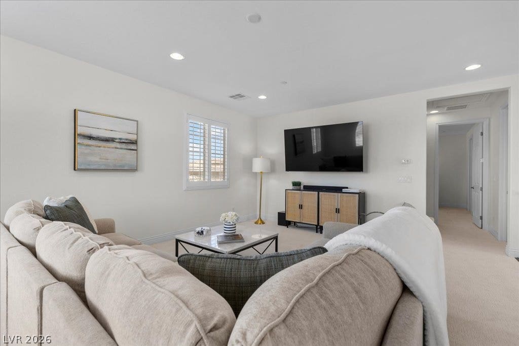 2828 Josephine Drive, Henderson, NV 89044 A well-lit living area offers an inviting atmosphere, perfect for daily relaxation and gatherings.