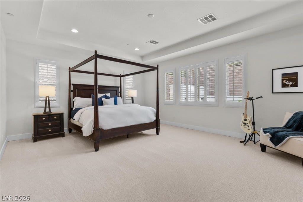 2828 Josephine Drive, Henderson, NV 89044 A well-lit bedroom with plantation shutters, offering a serene retreat.