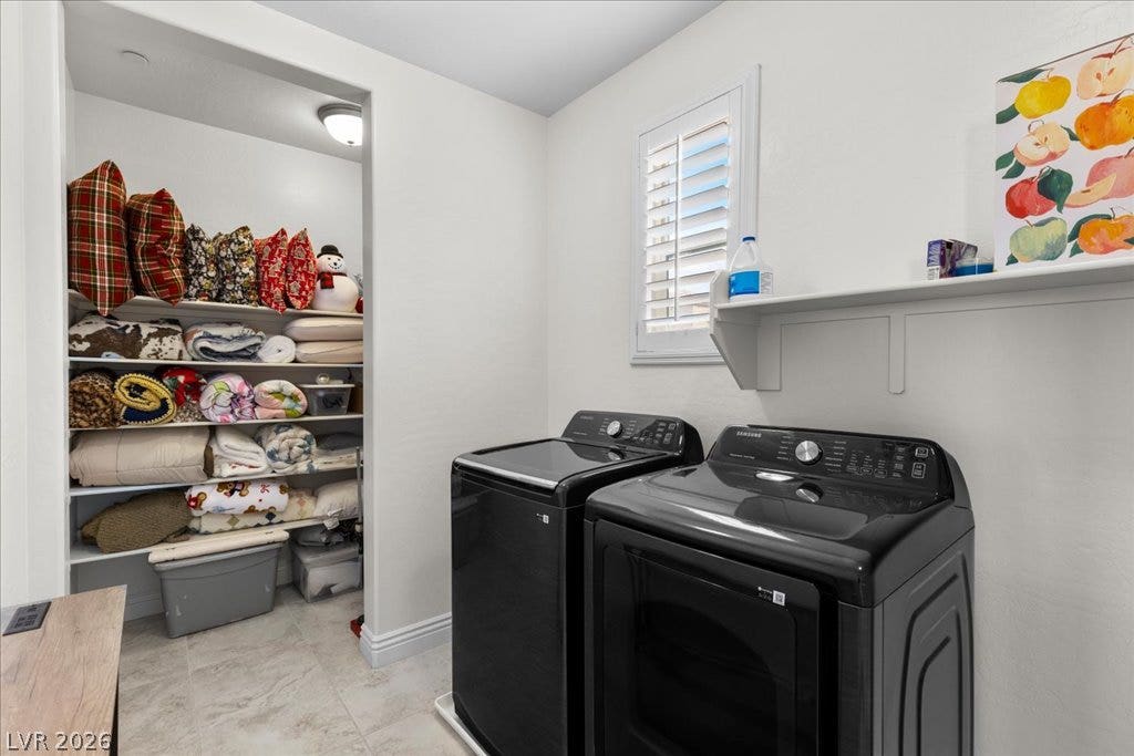 2828 Josephine Drive, Henderson, NV 89044 A well-organized upstairs laundry room offers practical storage solutions.