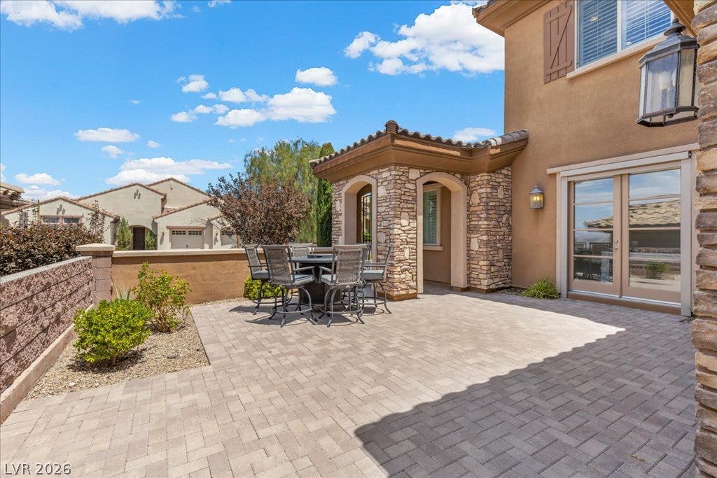 2828 Josephine Drive, Henderson, NV 89044 An inviting stone patio offers a private outdoor retreat for entertaining and relaxation.