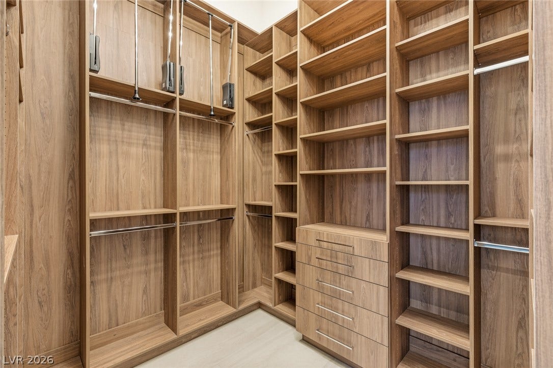 Customizable closet solutions maximize storage space with integrated shelving and hanging areas.