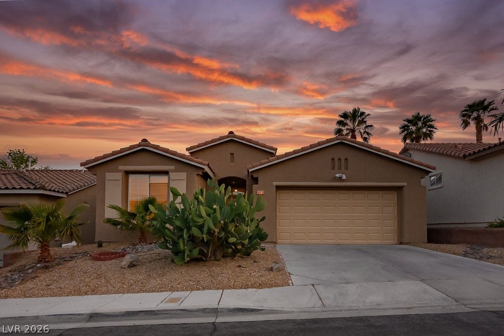 10513 Shanna Trellis Avenue, Las Vegas, NV 89144 Mediterranean / spanish-style home featuring driveway, stucco siding, a garage, and a tile roof