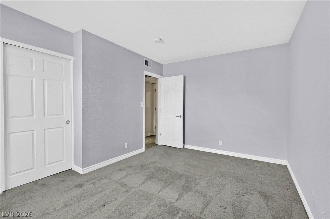 5081 River Glen Drive, #97, Las Vegas, NV 89103 Plush carpeting underfoot complements the crisp baseboards and clean lines of this quiet bedroom.