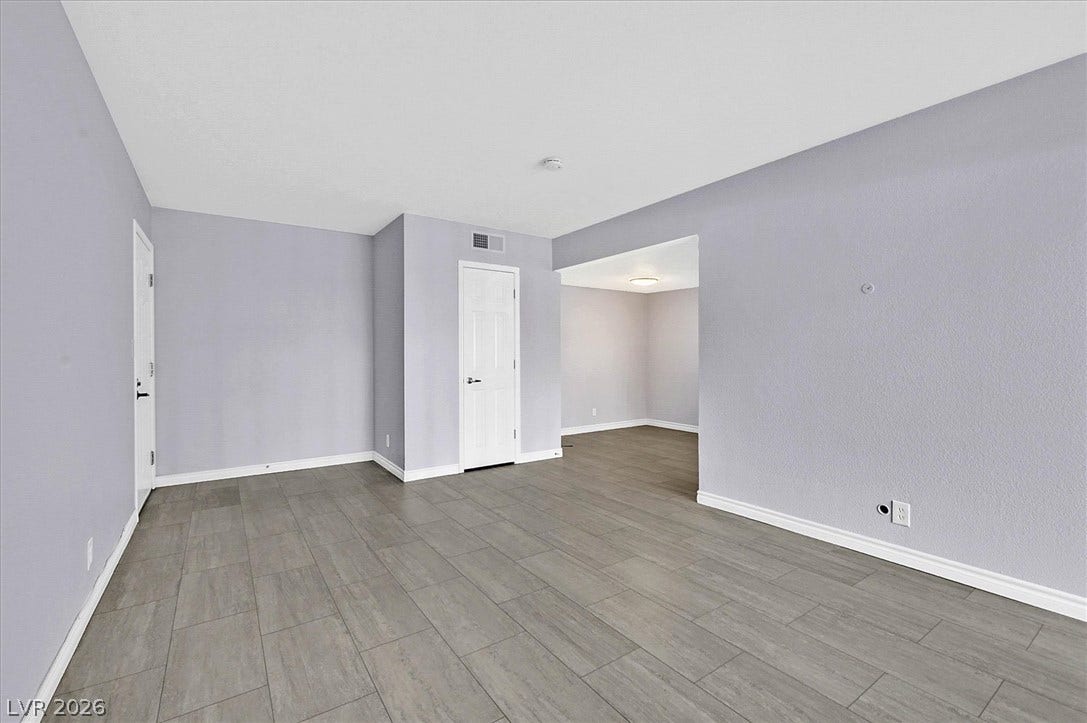 5081 River Glen Drive, #97, Las Vegas, NV 89103 Clean lines and durable Vinyl flooring define this versatile, open living area.
