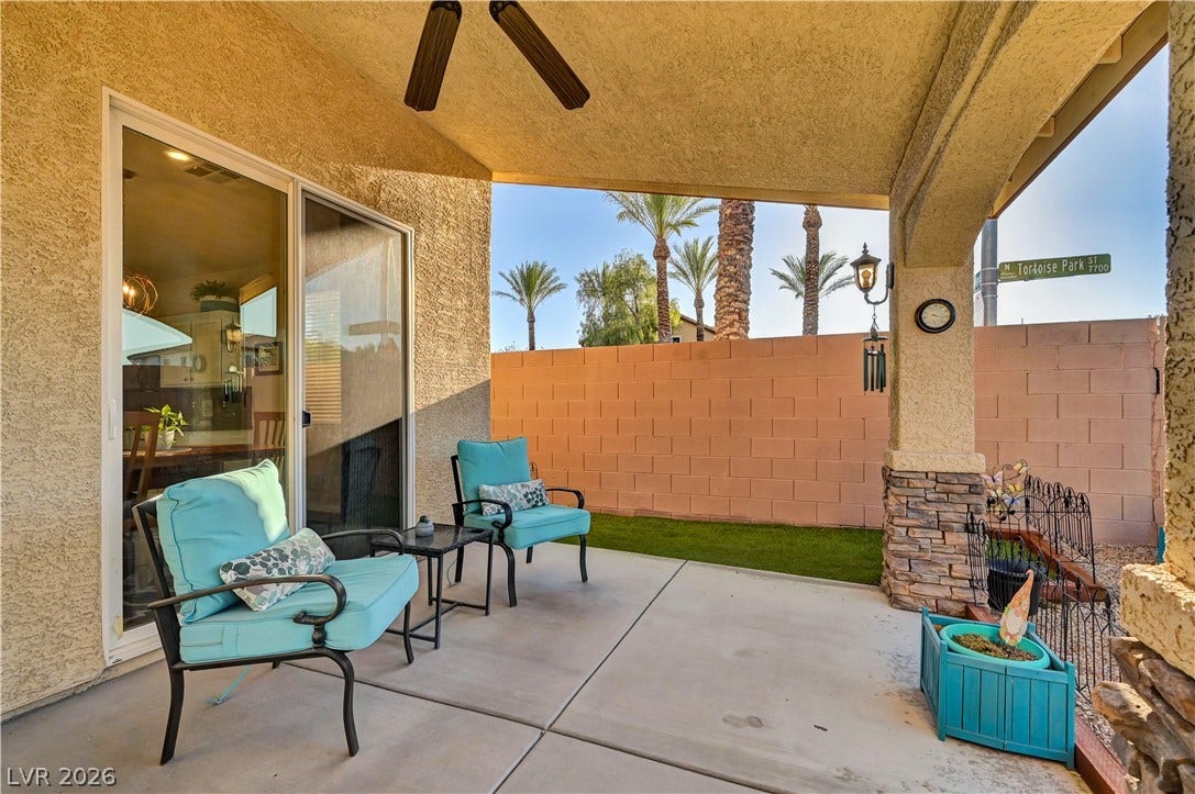 9928 Tradition Creek Avenue, Las Vegas, NV 89149 An inviting covered patio offers a private outdoor retreat with space for relaxation.