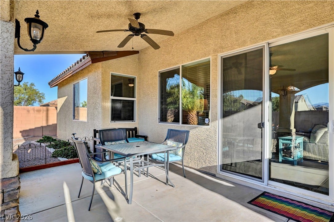 9928 Tradition Creek Avenue, Las Vegas, NV 89149 A spacious covered patio offers a comfortable outdoor living area for relaxation.