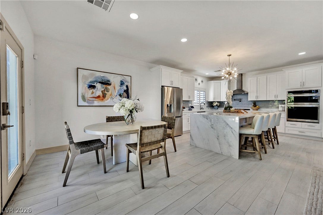 Culinary excellence meets casual dining in this well-appointed kitchen and breakfast area.