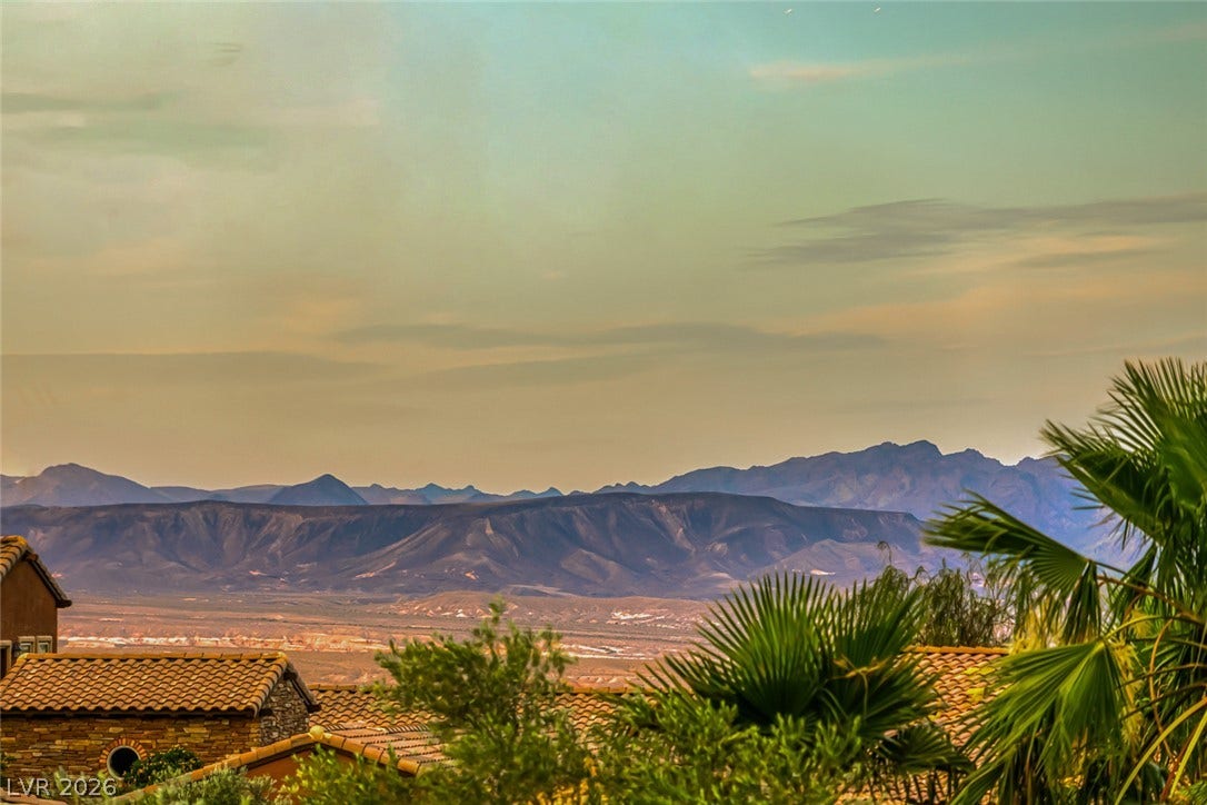 70 Portezza Drive, Henderson, NV 89011 Perched above the valley, enjoy inspiring vistas of distant mountains and terracotta rooftops.