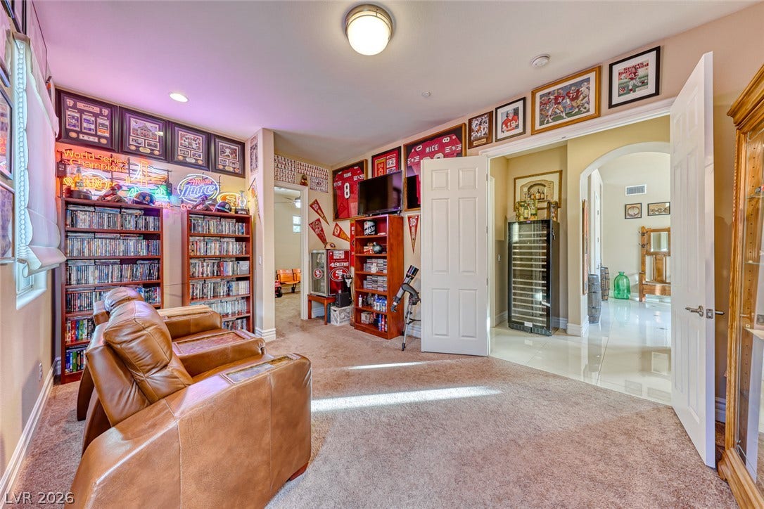 70 Portezza Drive, Henderson, NV 89011 A dedicated recreation room offers ample storage and a clear path to other living areas.