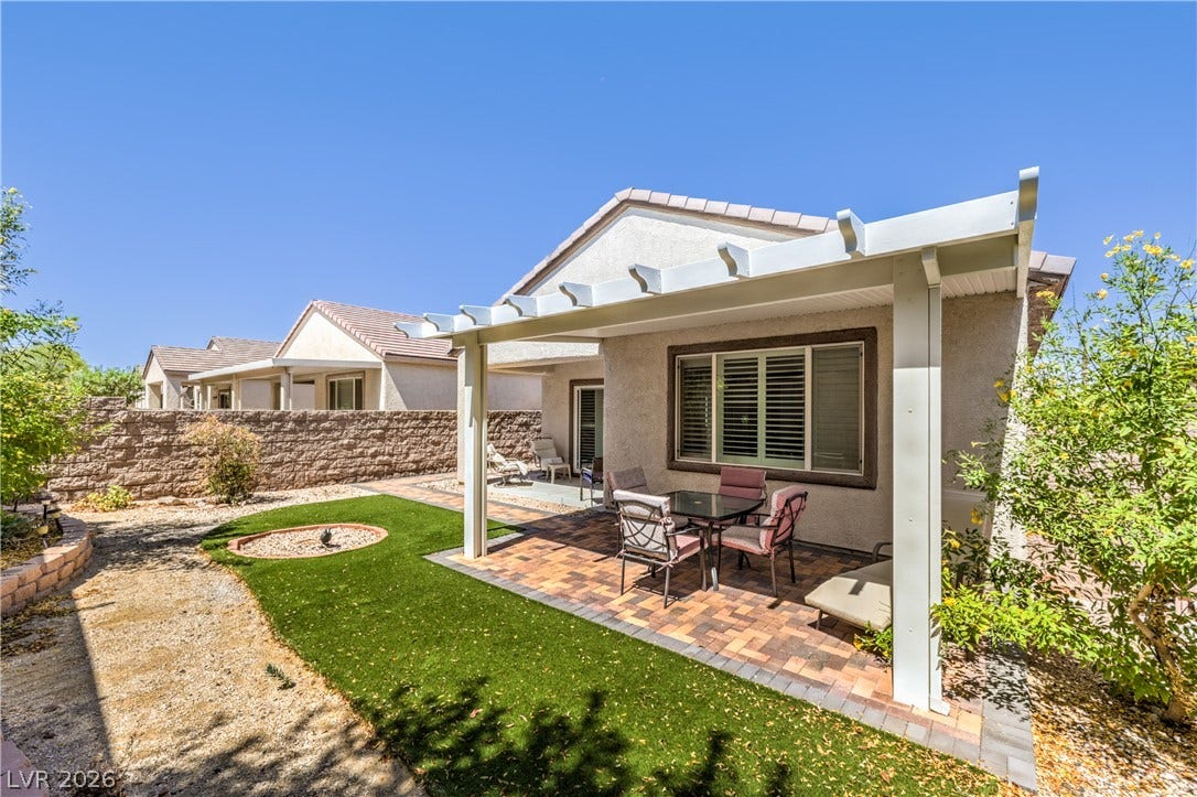 2439 Erastus Drive, Henderson, NV 89044 Mature Low Maintenance Landscaping with Decorative Rock, Shrubs, and Trees with Automatic Irrigation System on Timer