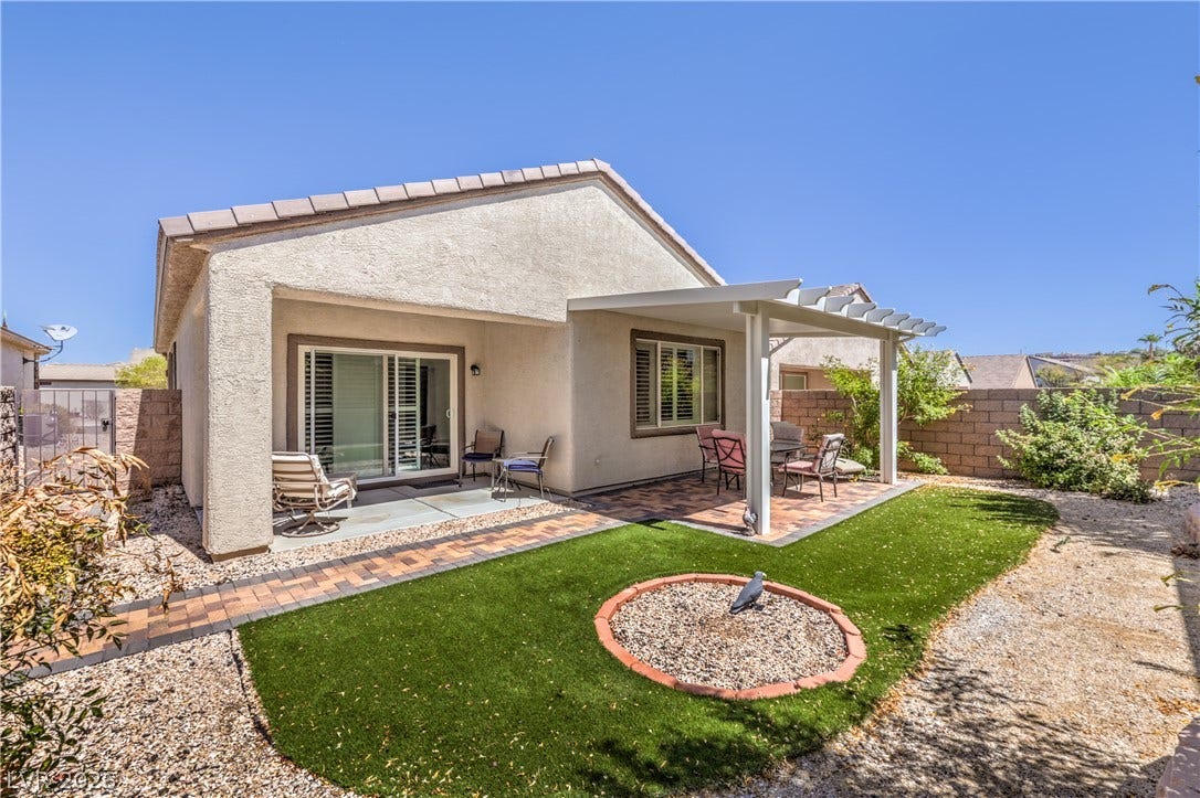 2439 Erastus Drive, Henderson, NV 89044 Fully Fenced Rear Yardw/ Covered Patio, Paver Patio, Gas BBQ Stub, and Synthetic Grass