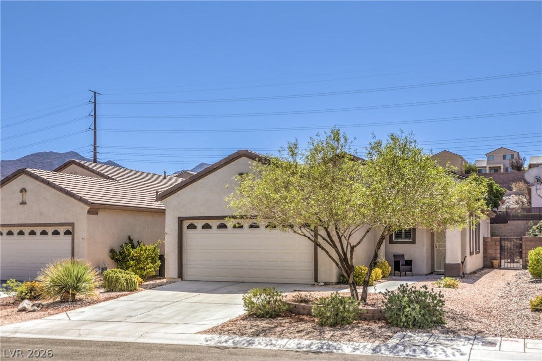 2439 Erastus Drive, Henderson, NV 89044 Mature Low Maintenance Landscaping with Decorative Rock, Shrubs, and Trees with Automatic Irrigation System on Timer