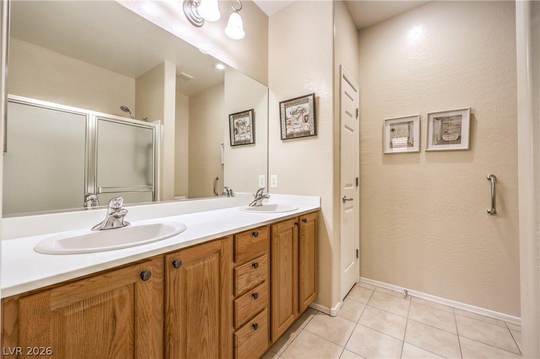2439 Erastus Drive, Henderson, NV 89044 Primary Bath with Raised Vanity, Dual Sinks, Shower, Comfort Height Toilet, and Tile Flooring
