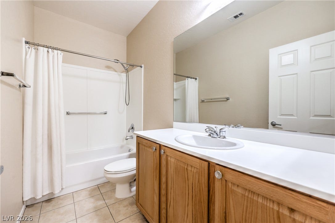 2439 Erastus Drive, Henderson, NV 89044 Secondary Bath with Raised Vanity, Tub/Shower Combination, and Tile Flooring