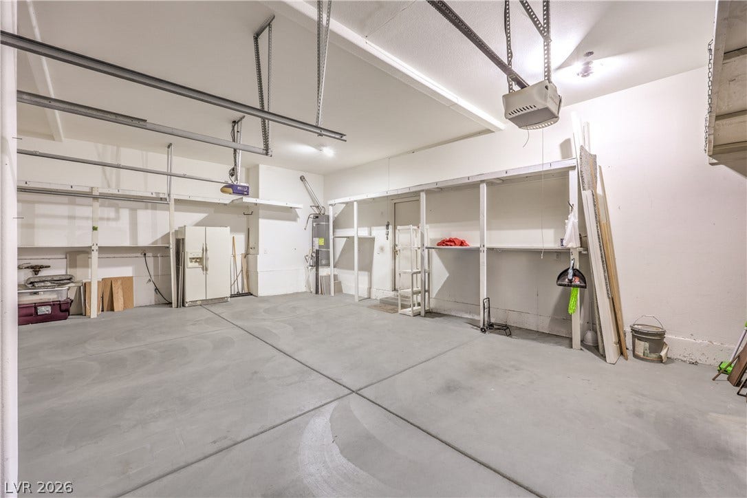 260 Quail Ranch Drive, Henderson, NV 89015 Ample storage solutions and a concrete floor define this spacious garage.
