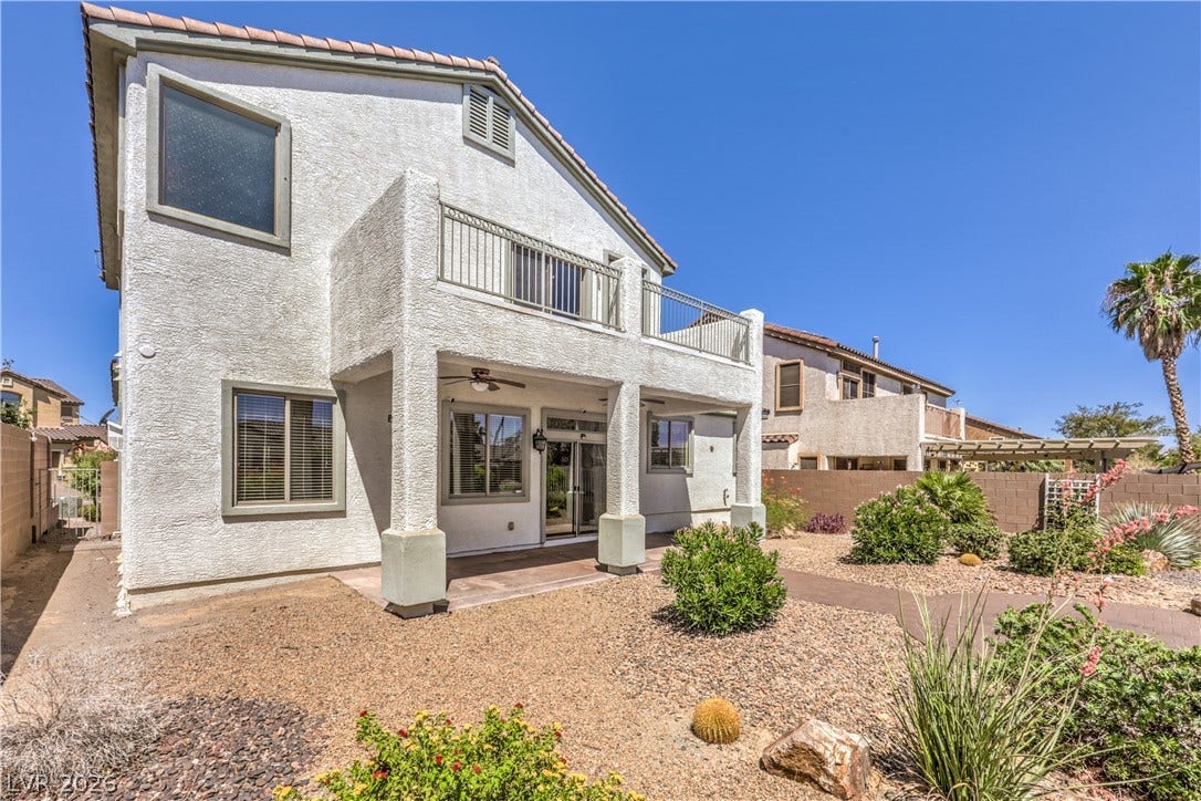 260 Quail Ranch Drive, Henderson, NV 89015 A spacious backyard patio provides an ideal setting for outdoor entertaining and enjoyment.
