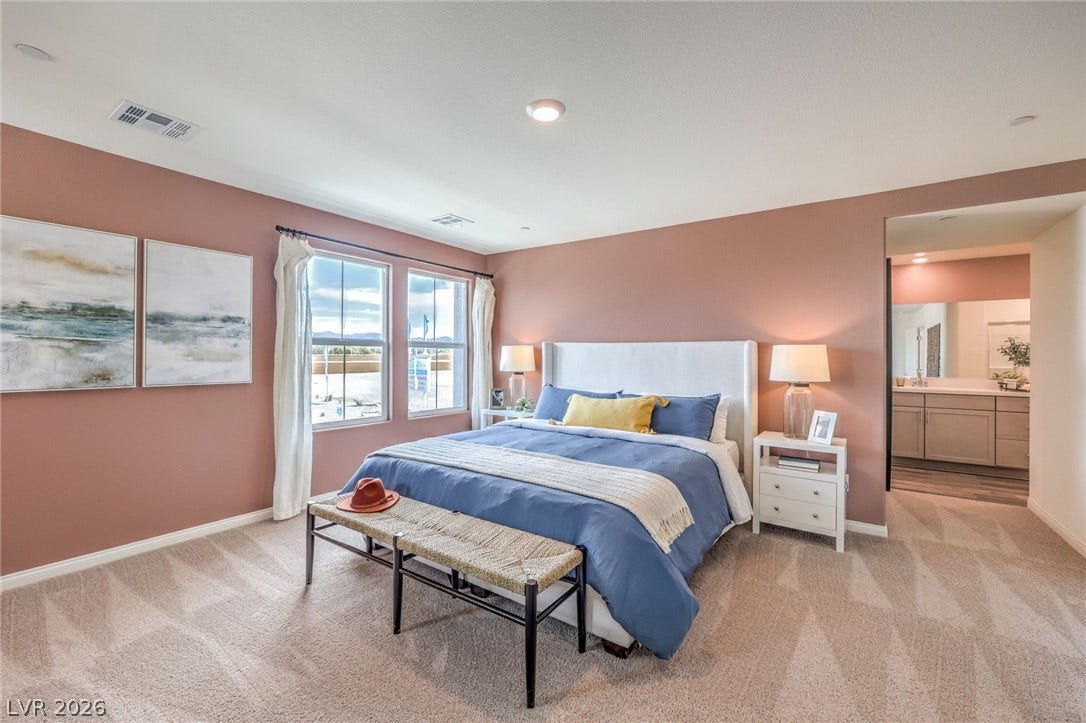1030 PEACOCK PLUME Avenue, Henderson, NV 89011 Photo is representational only; actual home finishes may vary. Bedroom featuring light carpet and baseboards