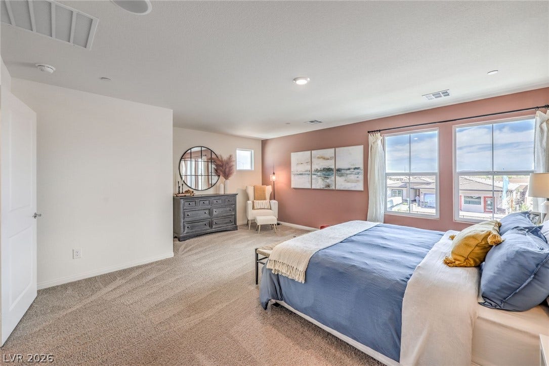 1030 PEACOCK PLUME Avenue, Henderson, NV 89011 Bedroom featuring carpet floors and baseboards. Photo is representational only; actual home finishes may vary.