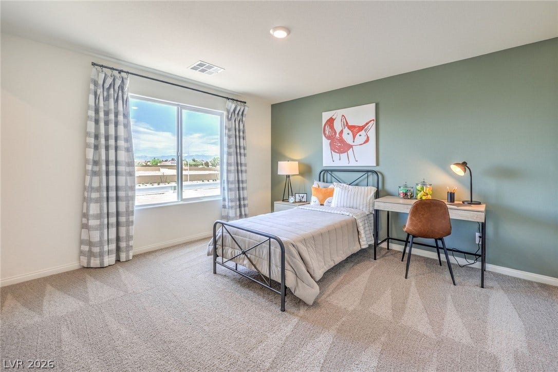 1030 PEACOCK PLUME Avenue, Henderson, NV 89011 Photo is representational only; actual home finishes may vary. Bedroom featuring carpet and baseboards