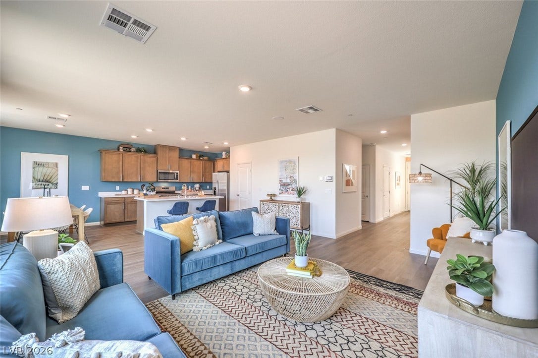 Living room featuring baseboards, visible vents, recessed lighting, and light wood finished .Photos are of a model home and are for representational purposes only.