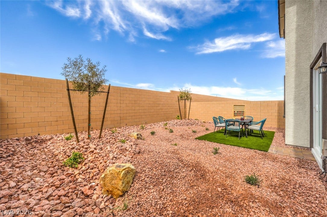 View of yard featuring a fenced backyard and a patio.Photos are of a model home and are for representational purposes only.