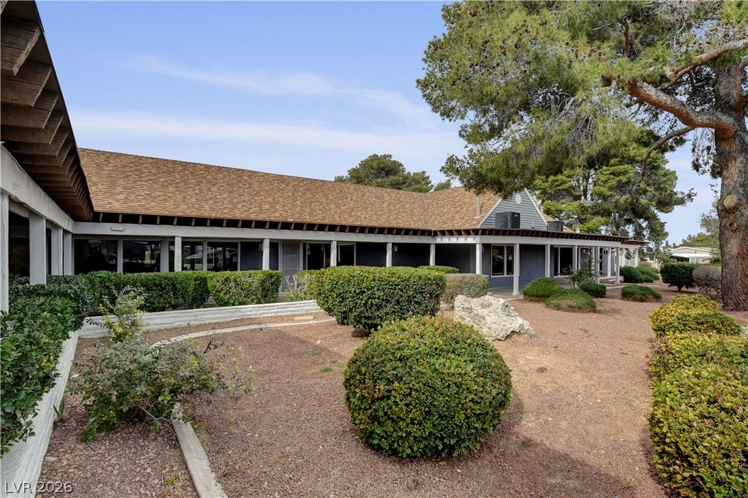 4589 Royal Ridge Boulevard, Las Vegas, NV 89103 Discover a charming residence with mature landscaping and an inviting covered patio, perfect for outdoor enjoyment.
