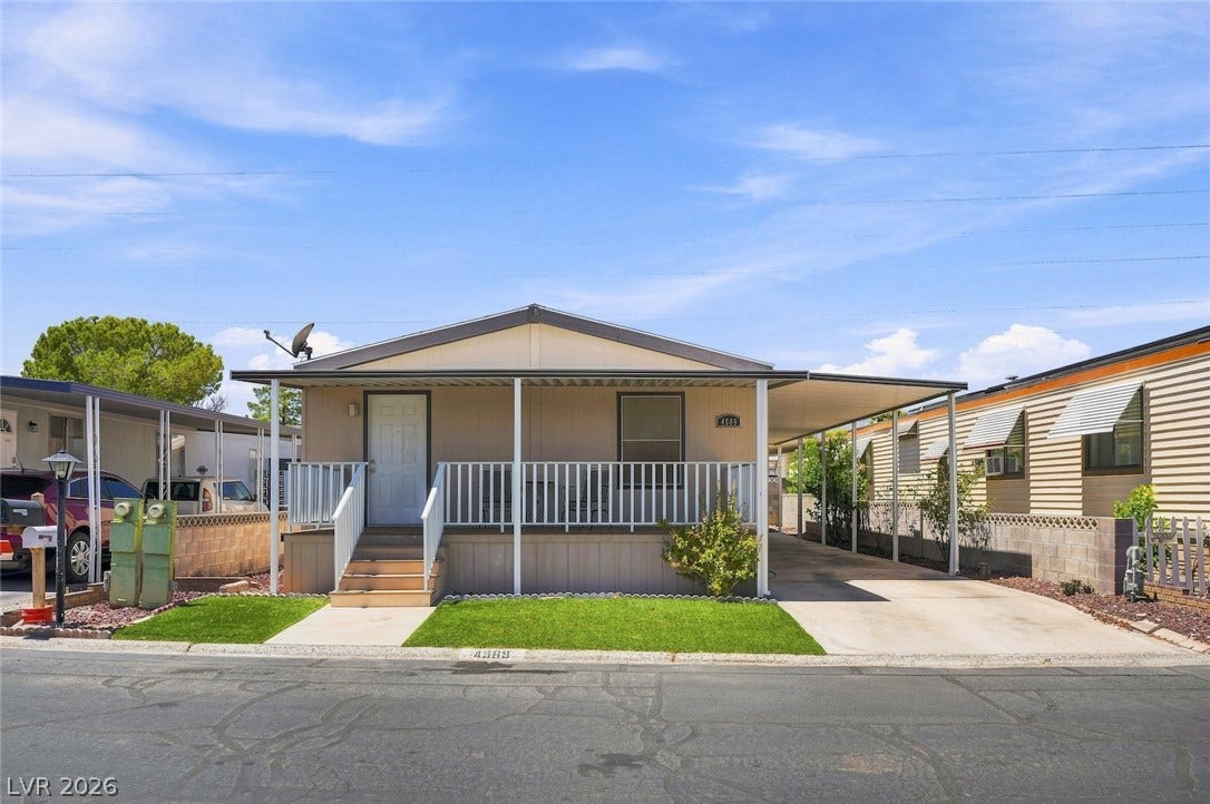 4589 Royal Ridge Boulevard, Las Vegas, NV 89103 A welcoming front porch leads to this charming residence with a convenient carport and neatly kept front yard.
