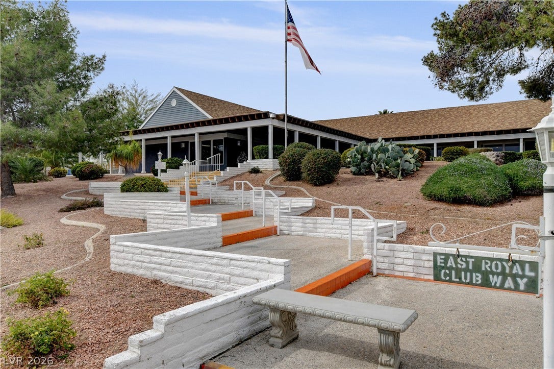 4589 Royal Ridge Boulevard, Las Vegas, NV 89103 A well-maintained clubhouse with tiered landscaping and accessible pathways welcomes guests.