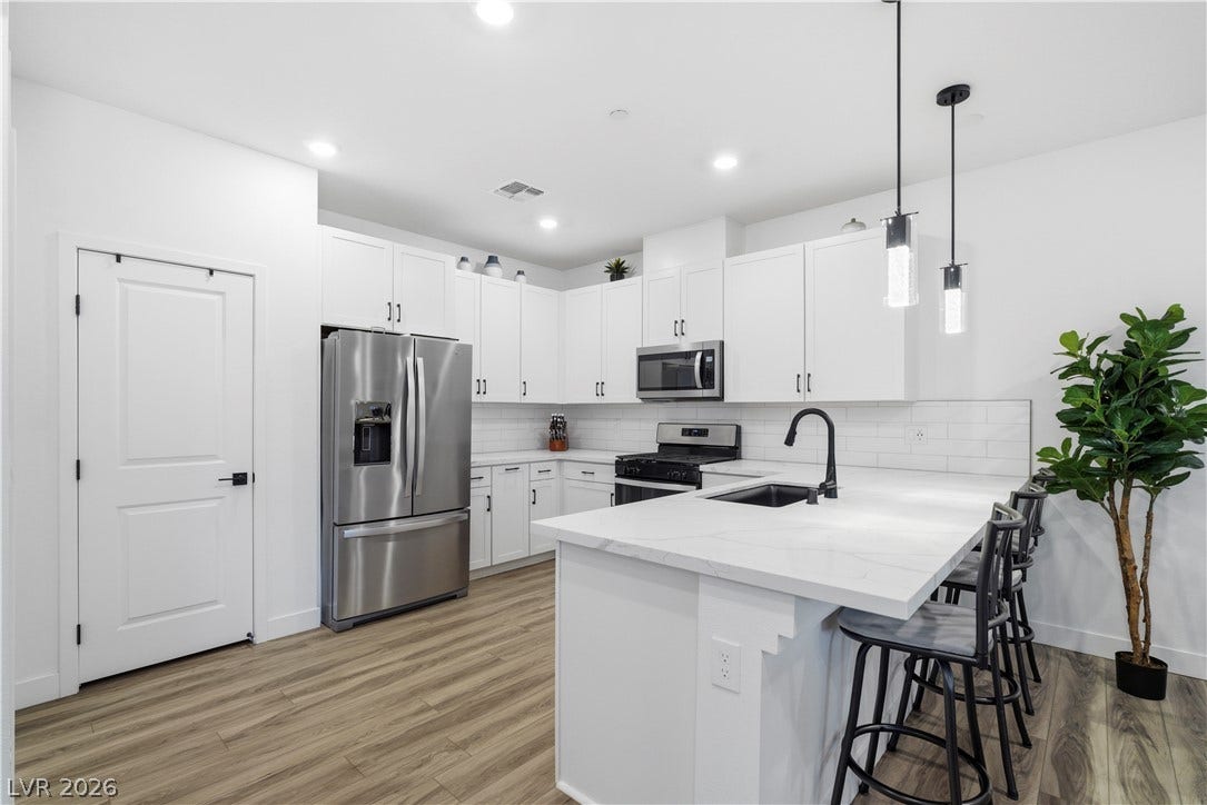 A well-appointed kitchen showcasing contemporary design with a practical layout for daily living.