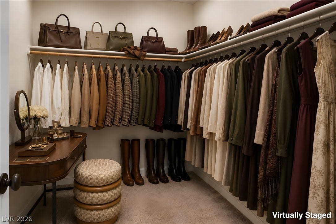 30 Benevolo Drive, Henderson, NV 89011 Customizable storage solutions define this well-appointed walk-in closet, maximizing organization and elegance.