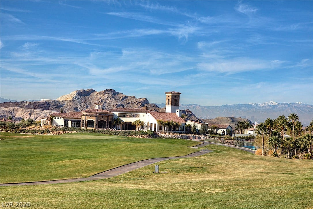 30 Benevolo Drive, Henderson, NV 89011 Golf course vistas stretch toward the mountains, framing this charming hillside estate.