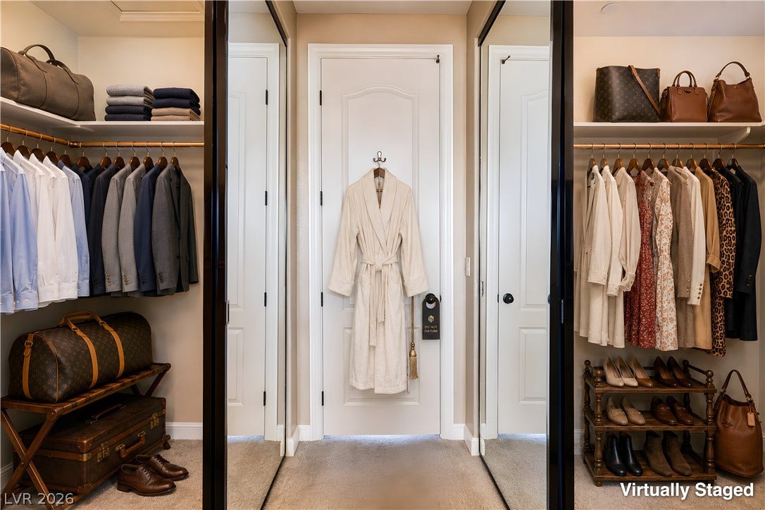 30 Benevolo Drive, Henderson, NV 89011 Customizable closet systems with mirrored sliding doors offer abundant storage and functional style.