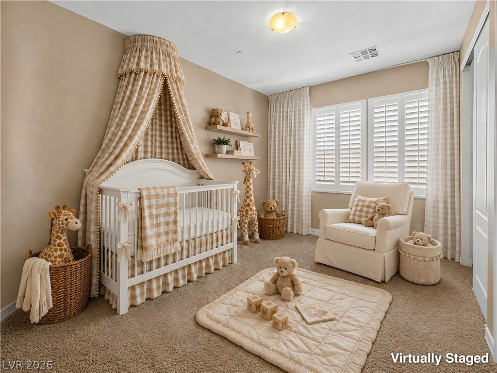 30 Benevolo Drive, Henderson, NV 89011 Soft, natural light fills this peaceful nursery, creating a serene and welcoming atmosphere.