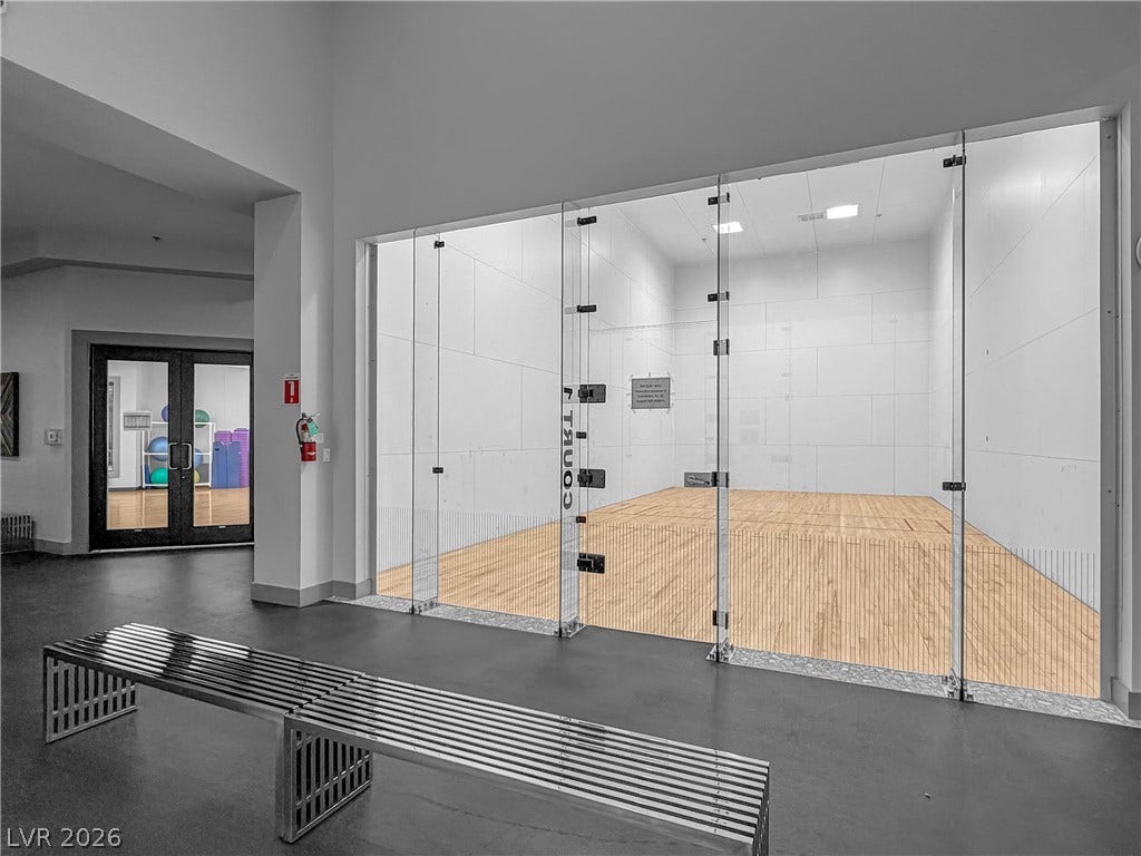 771 White Dogwood Court, Las Vegas, NV 89148 A private indoor squash court with pristine hardwood flooring awaits spirited competition.