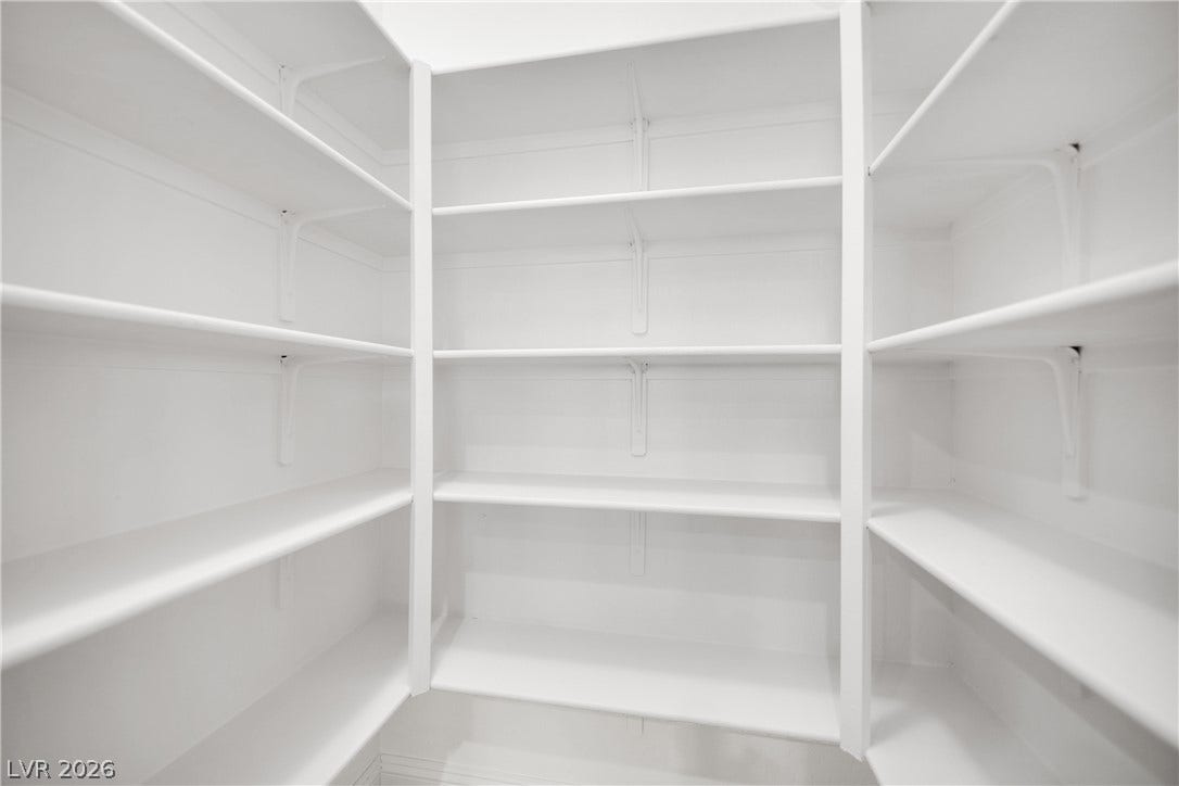 771 White Dogwood Court, Las Vegas, NV 89148 Ample, well-organized shelving provides abundant storage space in this dedicated pantry.