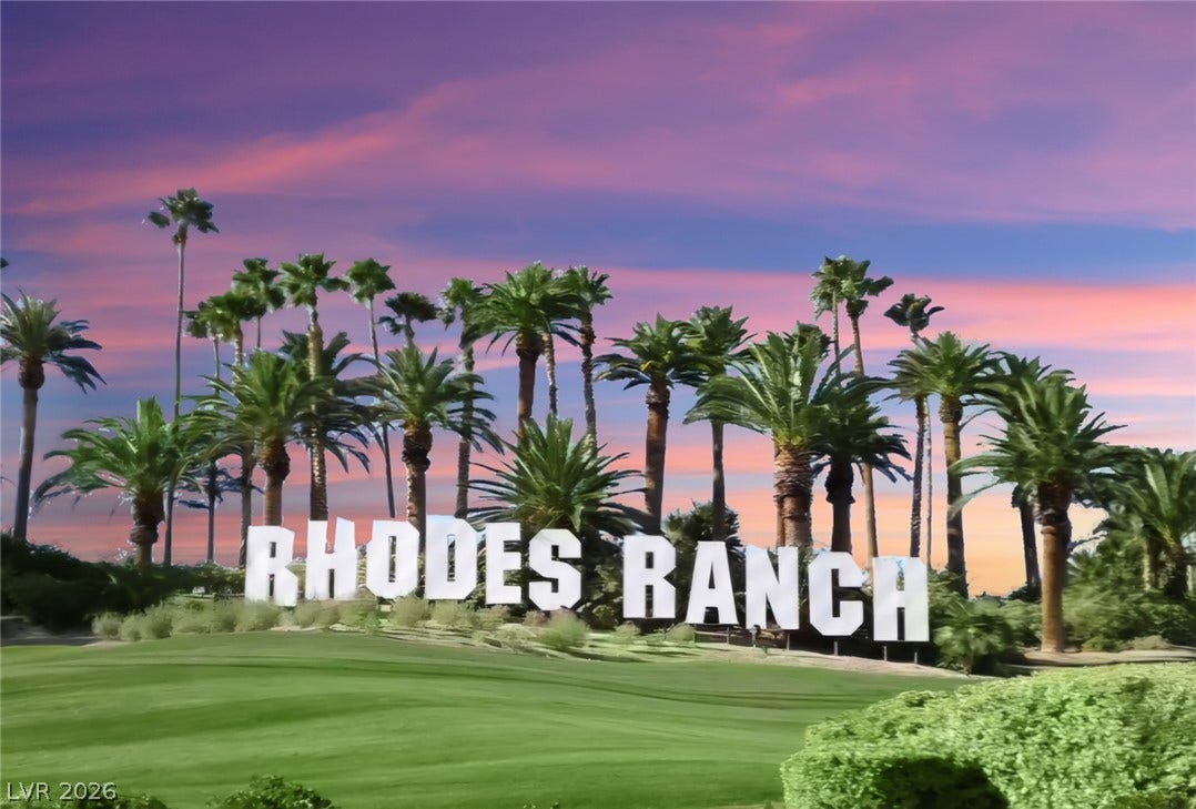 771 White Dogwood Court, Las Vegas, NV 89148 Lush golf course greens extend below towering palms and the prominent "Rhodes Ranch" signage, all set against a vibrant, evening sky.